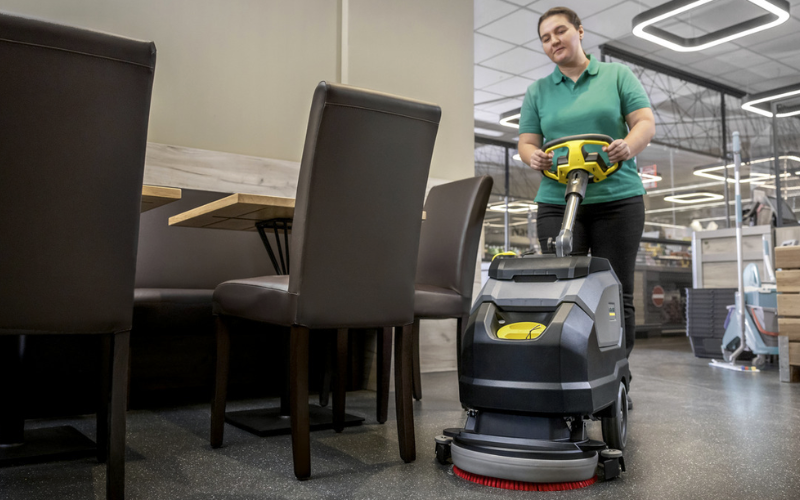 Compact Walk-Behind Floor Scrubbers in use