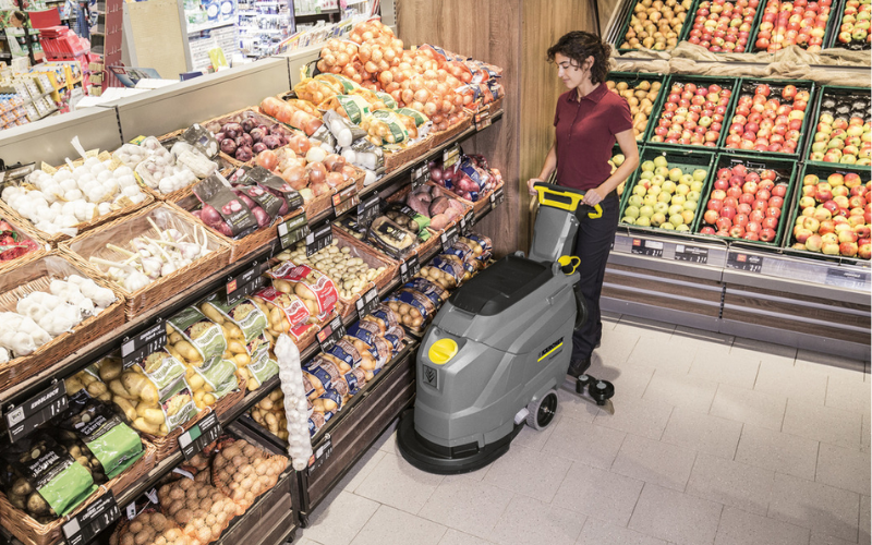Walk-Behind Floor Scrubbers in use